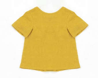 Naaipatroon voor een T-shirt. Eenvoudige top juli met korte mouwen voor meisje of jongen van 1 maand tot 6 jaar.
