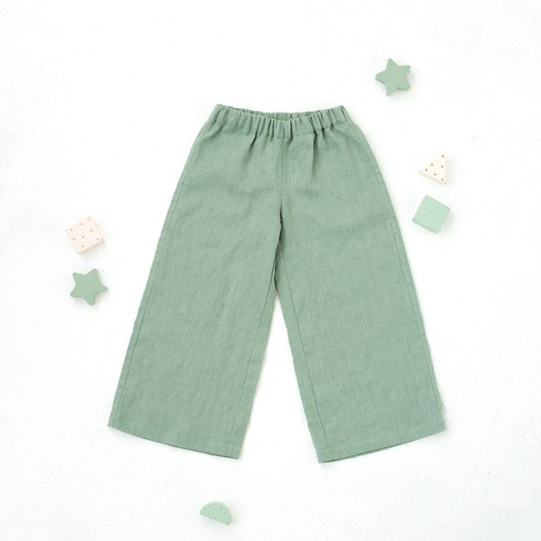 PDF file for the sewing pattern of wide leg pants for kids. Susie pants. Sizes 2-6 years.