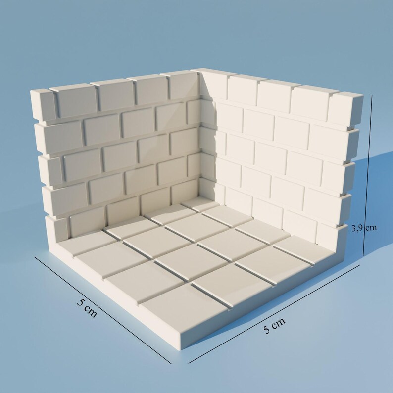 Puede incluir: Un diorama de esquina de ladrillo blanco con una base de 5 cm por 5 cm y una altura de pared de 3,9 cm.