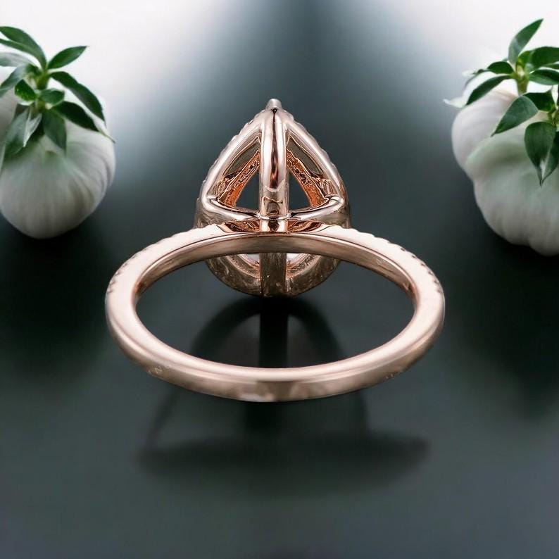 ペアシェイプのモルガナイト婚約指輪、14Kローズゴールドのハロー