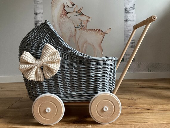 Grey wicker shop pram