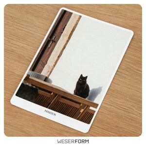 Eine Minden Postkarte für Katzenliebhaber und Stadtentdecker aus der Fischerstadt - Ansichtskarte- Grußkarte - Tiermotiv