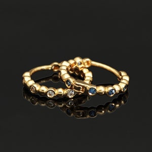 Solid 14K Gold Huggie Hoops Beaded with Gold and Blue CZ Stones,  Helix Hoop, Tragus Piercing, Septum Gold Jewelry, Earrings with Blue Gems