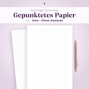Op de afbeelding: Twee vellen wit A4-papier met een donkergrijs puntjespatroon, met opties voor 5mm en 10mm tussenruimte. De tekst luidt "Sofortiger Download", "Gepunktetes Papier" en "A4 - 5mm - 10mm Abstände". Een roségouden pen ligt aan de rechterkant.
