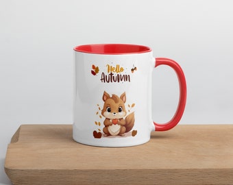 White mug with ceramic handle with orange colored interior, autumn model with a cute squirrel. Customizable handmade model