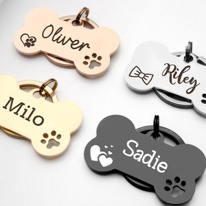 Dog tag engraver now at your local pet store! $8.99 Any tag, double sided  with multiple font options. Cheaper than any of the big box stores!!, By  Liberty Pet & Supply