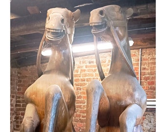 Pair of wooden prancing horses