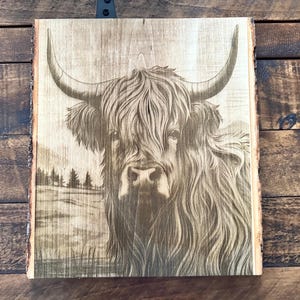 Highland cow sign.
