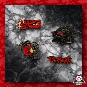 Peut inclure: Quatre épingles en émail noir et rouge représentant des personnages et des images de la série d'anime et de manga Berserk. Les épingles représentent l'œil de Guts, l'armure Berserker, l'épée de Guts et le logo Berserk.
