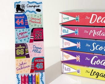 May include: A colorful bookmark featuring hockey jerseys with names and numbers, and the text "Off Campus." Next to the bookmark are stacked books with colorful spines and the series title "Off-Campus."
