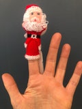 Hand knitted Santa - Christmas finger puppet