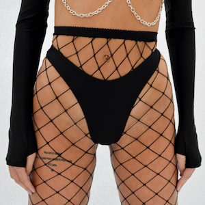 May include: Black fishnet tights with a black high-waisted bottom. The tights have a diamond pattern.