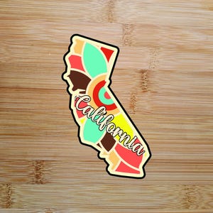 May include: A colorful outline of the state of California with a stylized flower design and the word "California" written in a curved font.