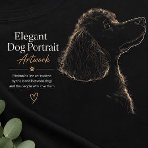 以下が含まれることがあります： 黒いTシャツに、横向きの犬のゴールドの線画ポートレートが描かれています。テキストは「Elegant Dog Portrait Artwork」、続いて「Minimalist line art inspired by the bond between dogs and the people who love them」とあり、肉球とハートのアイコンが添えられています。