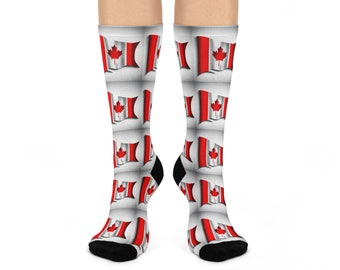 May include: White socks with a repeating pattern of the Canadian flag. The flag is red and white with a red maple leaf.