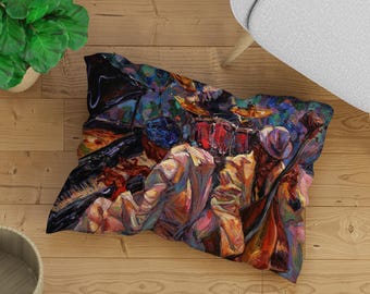 May include: A colorful pillow featuring an abstract painting of musicians playing instruments. The painting is done in a vibrant style with bold strokes and bright colors. The pillow is perfect for adding a touch of art and personality to any room.