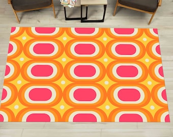 May include: A retro-style area rug with a repeating pattern of overlapping circles in shades of yellow, orange, and pink.