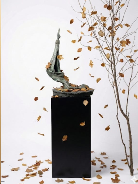 sculpture is surrounded by the delicate dance of falling autumn leaves, WALL ART