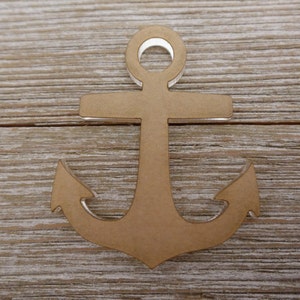 May include: A brown wooden anchor cutout, perfect for crafting projects or home decor.