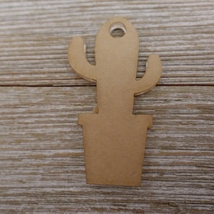 May include: A brown wooden cutout of a cactus in a pot. The cactus has a hole at the top for hanging.