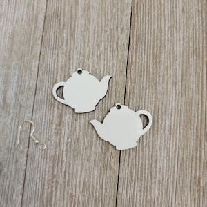 May include: Two unfinished wooden teapot earrings with silver earring hooks.