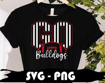 May include: Black t-shirt with a white and black striped design that says "GO Bulldogs" with a football graphic in the middle.
