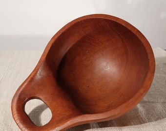 Teak bowl. Mid-Century Modern Tiki Style. Rustic and 1960s vintage.