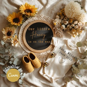 May include: A baby announcement with a cream onesie printed with "Baby Wilson June 202X", yellow crochet baby shoes, sunflowers, and a letter board saying "Our little Honey is on the way". Decorative bees and flowers complete the scene.