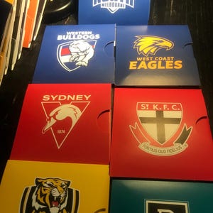 Limited edition AFL one dollar coins uncirculated and carded