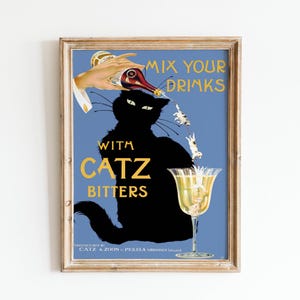 May include: Vintage-style poster with a black cat silhouette and the text "MIX YOUR DRINKS WITH CATZ BITTERS." A hand pours liquid from a bottle into a cocktail glass. The poster has a blue background and a wooden frame.