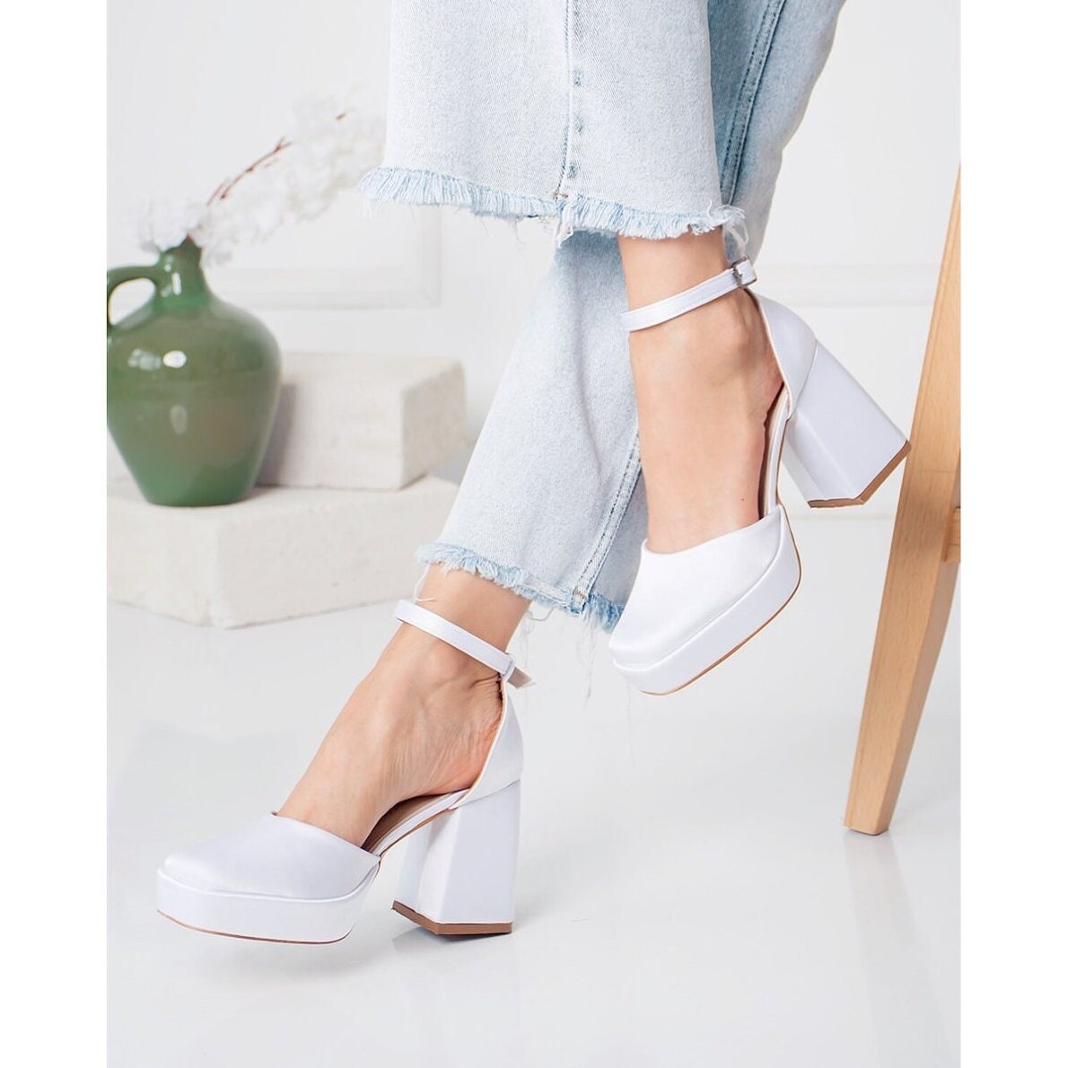white platform pumps