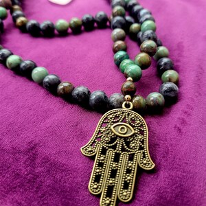 Mala beads with Hamsa