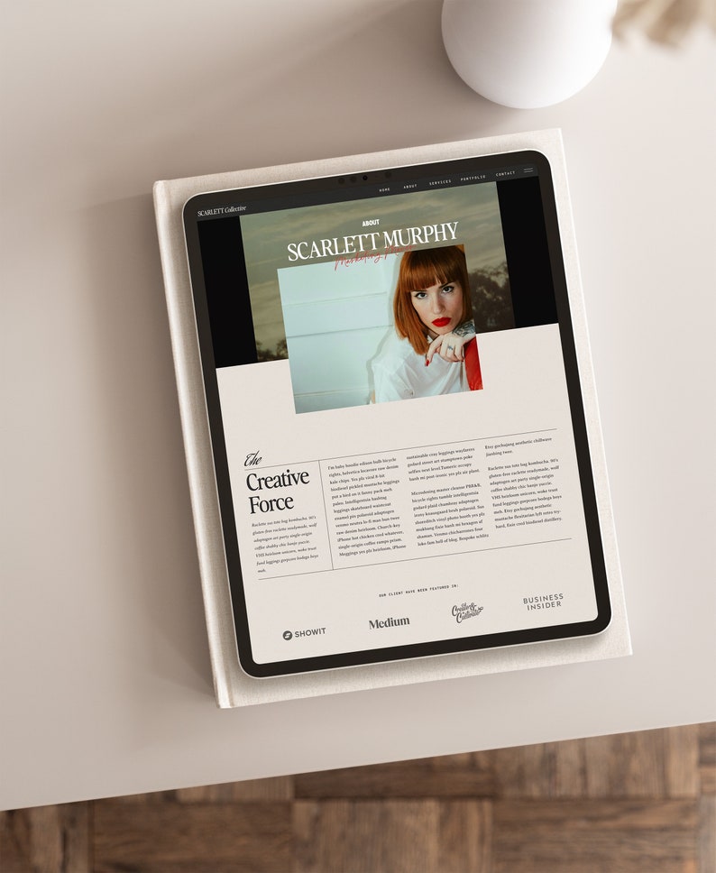 May include: A website screenshot featuring a woman with red hair and a red lip, with the text "Scarlet Murphy" and "The Creative Force" on the page. The website also features logos for "Showit", "Medium", and "Business Insider".