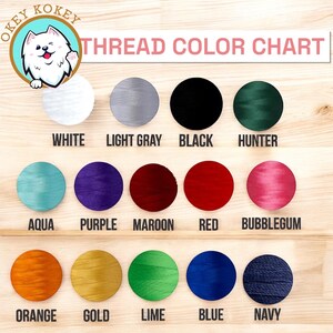 May include: A thread color chart with a variety of colors, including white, light gray, black, hunter green, aqua, purple, maroon, red, bubblegum pink, orange, gold, lime green, blue, and navy. The chart is labeled "THREAD COLOR CHART".