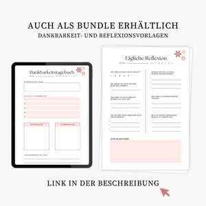 May include: A digital tablet and a printed page with daily reflection templates. The tablet displays a gratitude journal layout with pink floral accents. The printed page features a similar design, offering prompts for self-reflection and journaling. Text in German is visible.