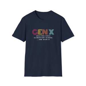Gildan softstyle tee in Navy blue that says Gen X in colorful large letters over smaller white letters that say Adulting Since Elementary School...and Over It