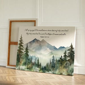 May include: A watercolor painting of a mountain range with a forest in the foreground. The painting has a quote from Psalm 121:1-2, "I lift up my eyes to the mountains—where does my help come from? My help comes from the Lord, the Maker of heaven and earth."