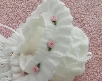 frilled baby hat with rosebuds