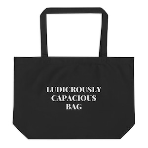 May include: A black tote bag with white text that reads "Ludicrously Capacious Bag".