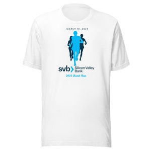 May include: White t-shirt with a blue and black graphic of runners. The graphic includes the text "svb Silicon Valley Bank 2023 Bank Run" and "MARCH 10, 2023".