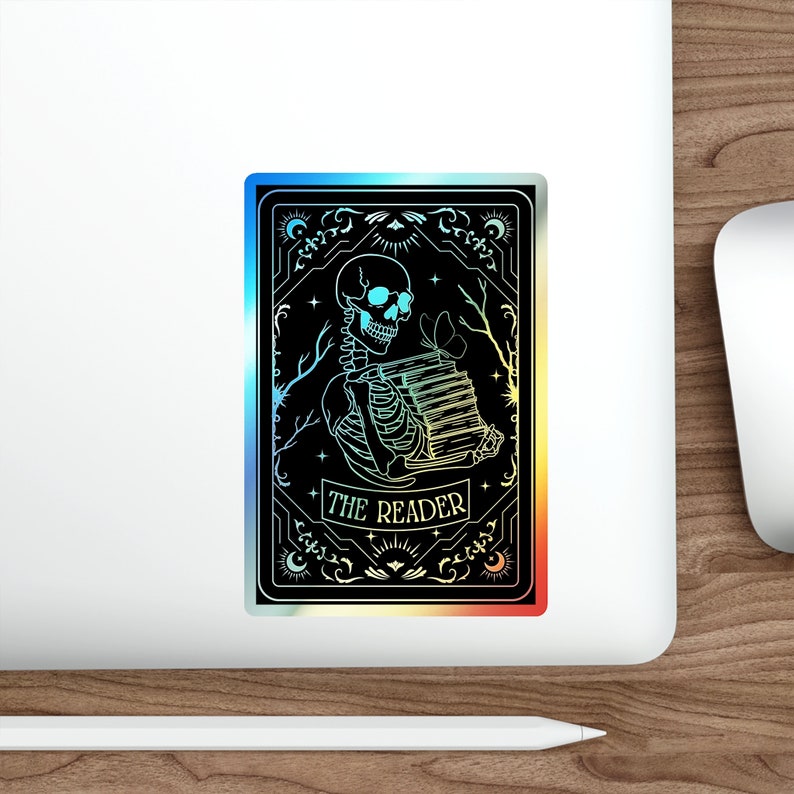 Holographic tarot card sticker featuring a skeleton holding a stack of books with a butterfly atop, surrounded by celestial stars and tree branches. Perfect for laptops, journals, water bottles, and scrapbooks. Ideal gift for readers and book lovers.