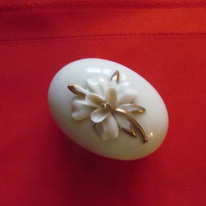 vintage egg shaped trinket box with floral decoration