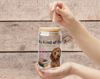 May include: A clear glass jar with a bamboo lid and a straw. The jar has a graphic of a dog and books with the text "My Kind of Day".