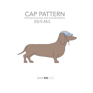 May include: Illustration of a dachshund wearing a light blue cap. The image includes the text "CAP PATTERN" and "FOR DACHSHUNDS AND SIMILAR BREEDS XS/S-M/L". The dog is brown with a white background. The text "Level" and three gray circles are also visible.