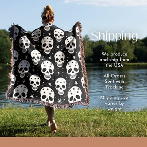May include: A black and white woven throw blanket with a skull and star pattern. The blanket has fringe on the edges. The text "Shipping" is visible in the image. We produce and ship from the USA. All orders sent with tracking. Shipping cost varies by weight.