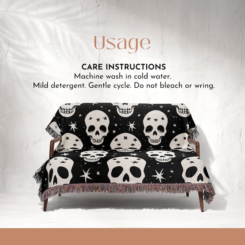 May include: Black and white throw blanket with a skull and star pattern. The blanket is draped over a couch. Care instructions: Machine wash in cold water. Mild detergent. Gentle cycle. Do not bleach or wring.