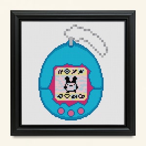 May include: A blue and pink pixelated image of a Tamagotchi, a virtual pet toy. The screen displays a cartoon character with the text "NOXY" and "AOVO"