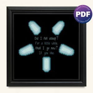 May include: Cross stitch pattern featuring a blue pixelated design with the text "Did I fall asleep? For a little while. Shall I go now? If you like."