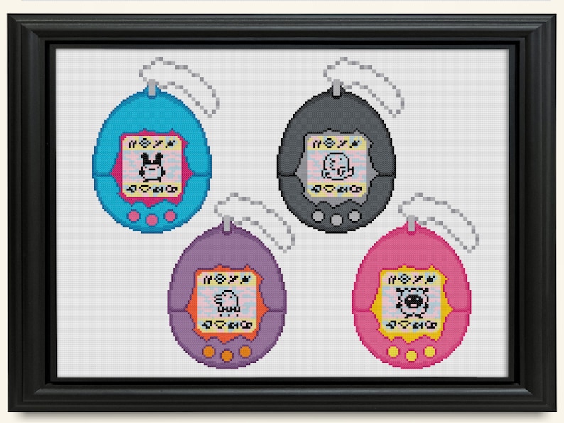 May include: Four colourful Tamagotchi toys, each with a different character on the screen. The toys are blue, grey, purple, and pink.