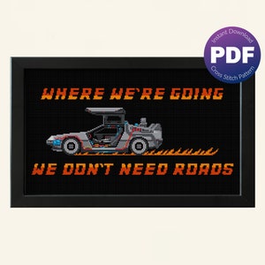 May include: A cross stitch pattern featuring a pixelated DeLorean time machine from the movie Back to the Future. The text "Where we're going, we don't need roads" is displayed above the car.